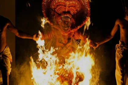 Dhanush Idli Kadai movie poster with actor in intense role, showcasing the journey of this blockbuster Tamil film with Hindi and English text for AajKyaHai.com readers