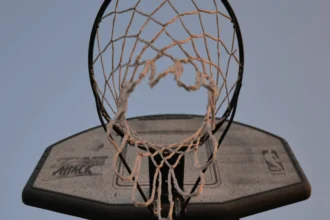 Ranveer Singh at Abu Dhabi NBA game courtside with basketball players, Bollywood star in sports event