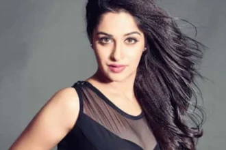 Deepika Kakkar smiling in a festive outfit, celebrating her birthday with family and friends, symbolizing her inspiring life journey from struggles to stardom in Hindi television.