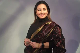 Divya Dutta smiling in a professional photoshoot, wearing traditional Indian attire, symbolizing her journey from humble beginnings to Bollywood stardom