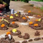 Govardhan Puja 2025 celebration with devotees offering Annakut (mountain of food) to Lord Krishna, depicting the rich Hindu traditions and festive spirit in vibrant colors.