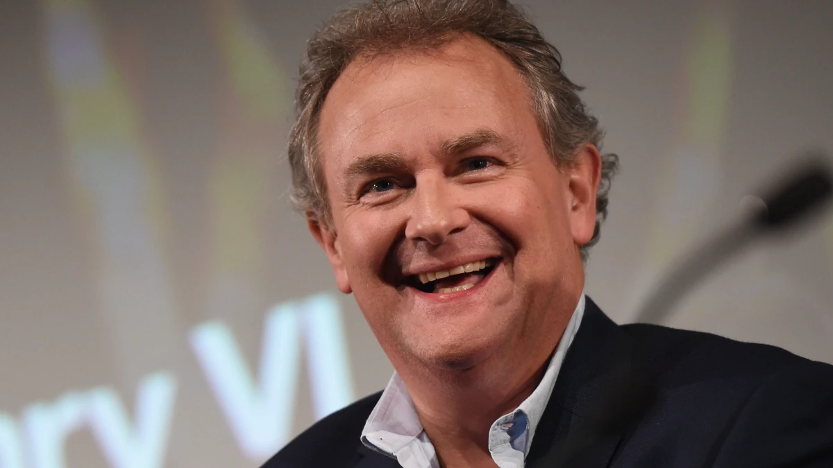 Hugh Bonneville smiling in a suit, from Downton Abbey to Hollywood films, on aajkyahai.com