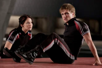 Josh Hutcherson smiling in a portrait, with text overlay in Hindi and English for his biography and birthday celebration on AajKyaHai.com