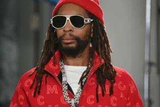 Lil Jon portrait photo with Hindi text overlay showing his journey from struggle to success as a famous American rapper and music producer, featured on AajKyaHai.com news website