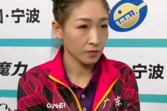 Liu Shiwen, the unbeatable queen of table tennis, holding a paddle and trophy, in action during a championship match, representing dominance in women's table tennis.