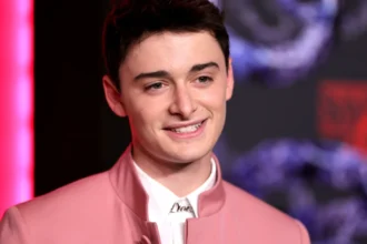 Noah Schnapp smiling in a casual photoshoot, from his role as Will Byers in Stranger Things to his recent projects and personal life updates