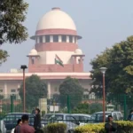 Supreme Court of India building with judges bench, symbolizing the referral of TET mandatory case to a larger bench for teacher recruitment eligibility decisions in Hindi and English news coverage