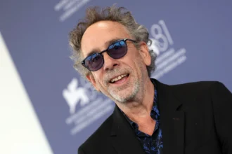 Tim Burton birthday celebration with his iconic characters Edward Scissorhands, Jack Skellington, and Beetlejuice in a dark fantasy style artwork