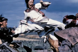 Zhang Ziyi in a glamorous pose, transitioning from Bollywood to Hollywood films, showcasing her international acting career